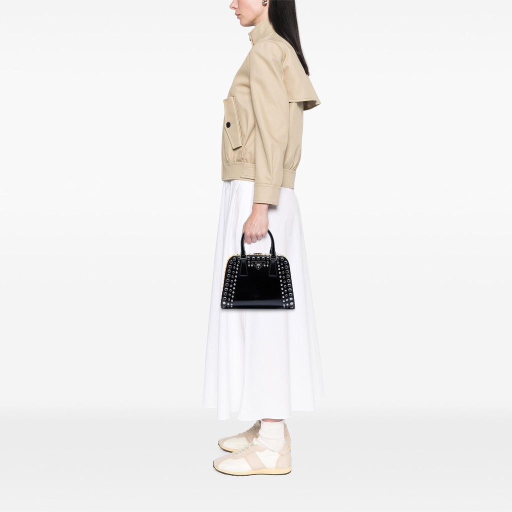 Prada Small Studded Saffiano Vernice Frame Top Handle Bag