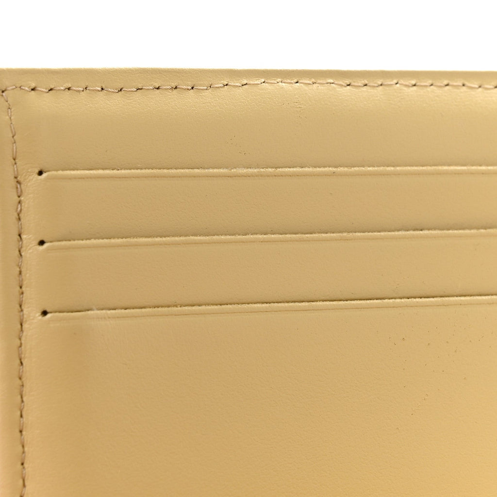 Caviar Quilted Compact Flap Wallet Yellow