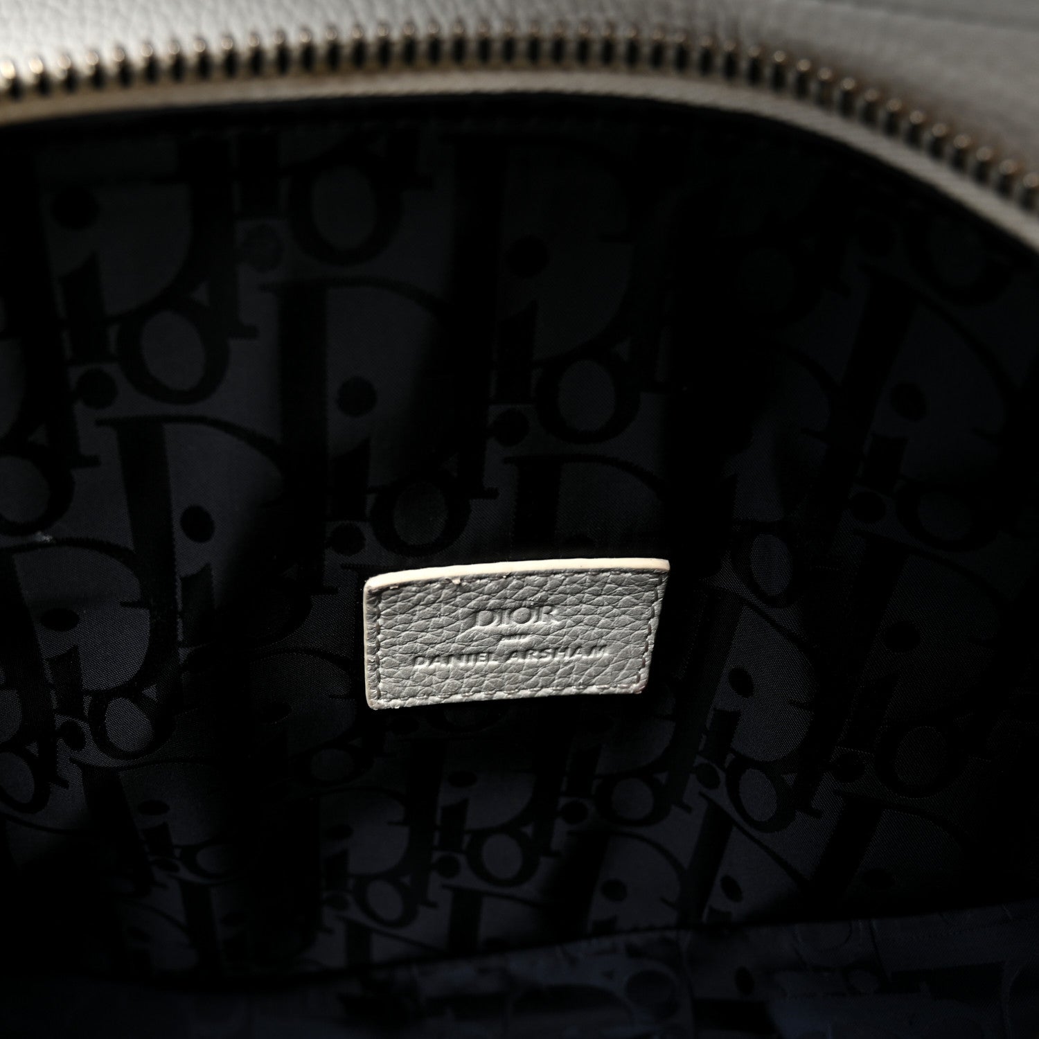 X Daniel Arsham Grained Calfskin Newspaper Print Saddle Bag White