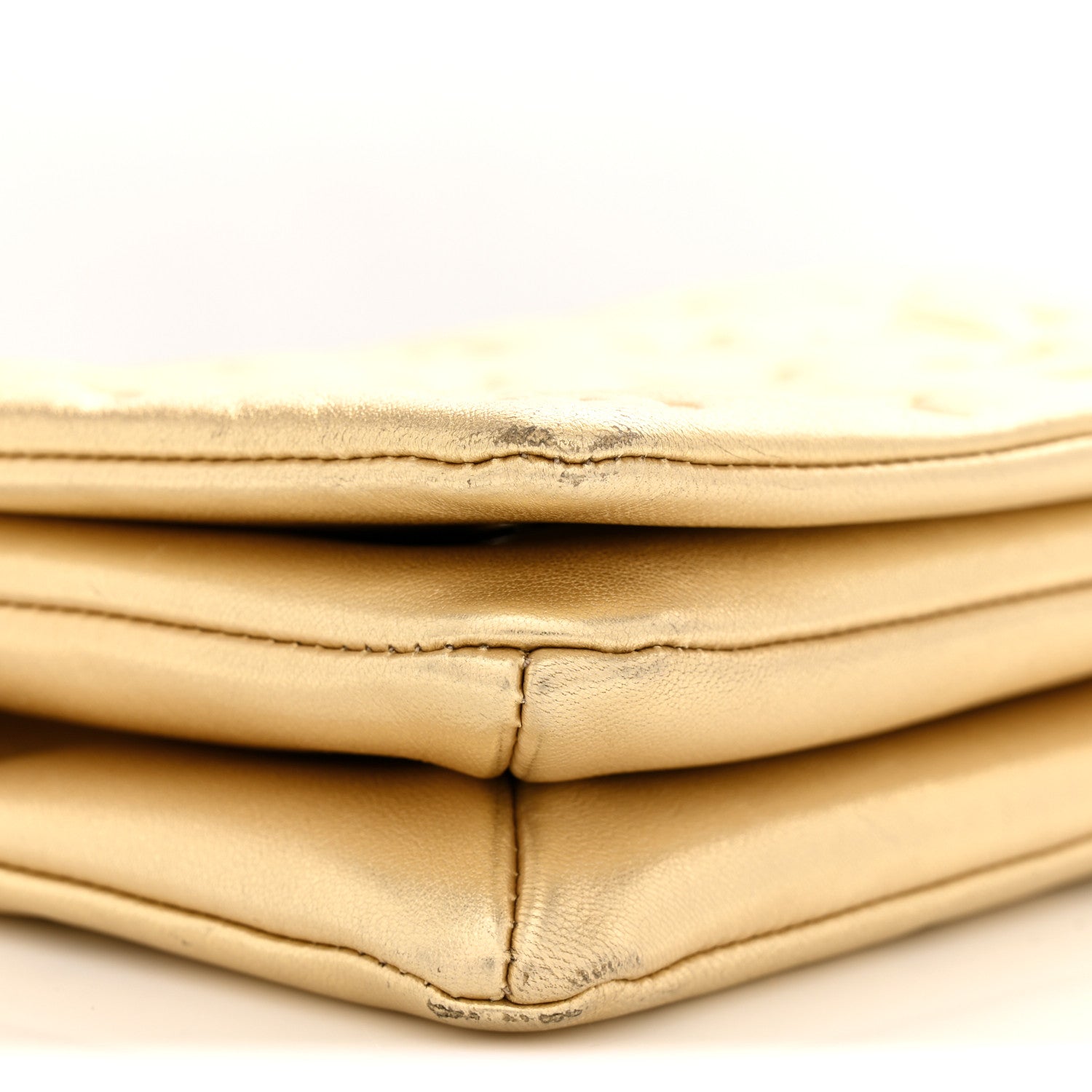Metallic Lambskin Embossed Monogram Pochette Coussin Gold