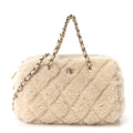 Shearling Quilted Barrel Clutch With Chain Beige