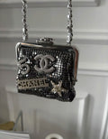 Chanel silver clutch with chain from the Coco Neige 2023/24 collection